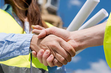 construction bids near syracuse ny image of construction workers shaking hands